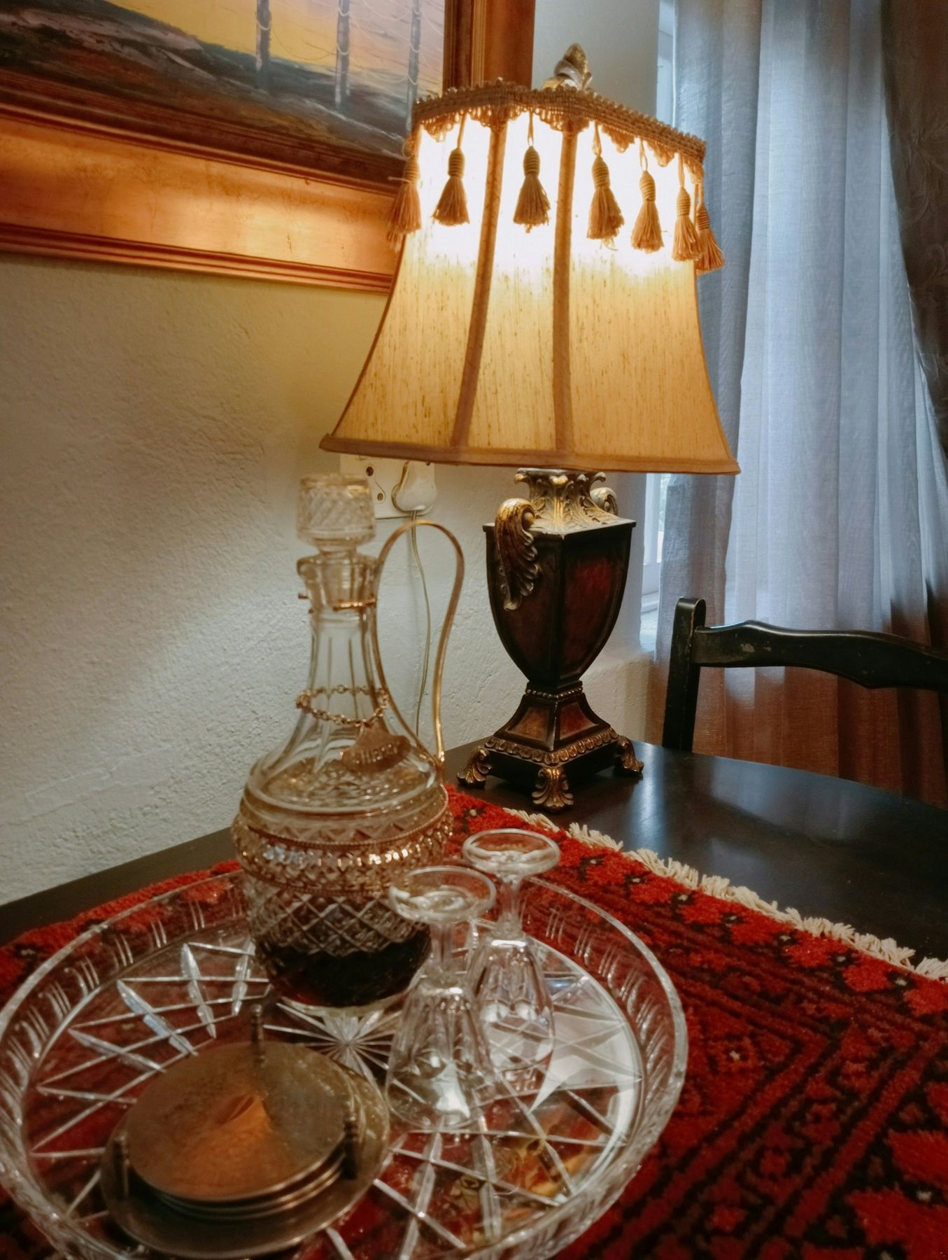 An antique lamp and crystal